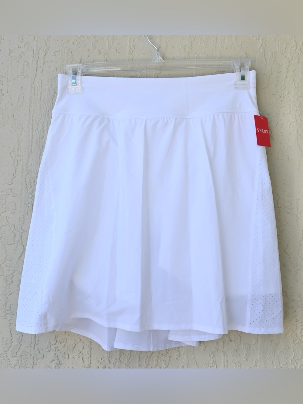 SPANX Get Moving Skort in White with Sporty Zip Pocket Waistband